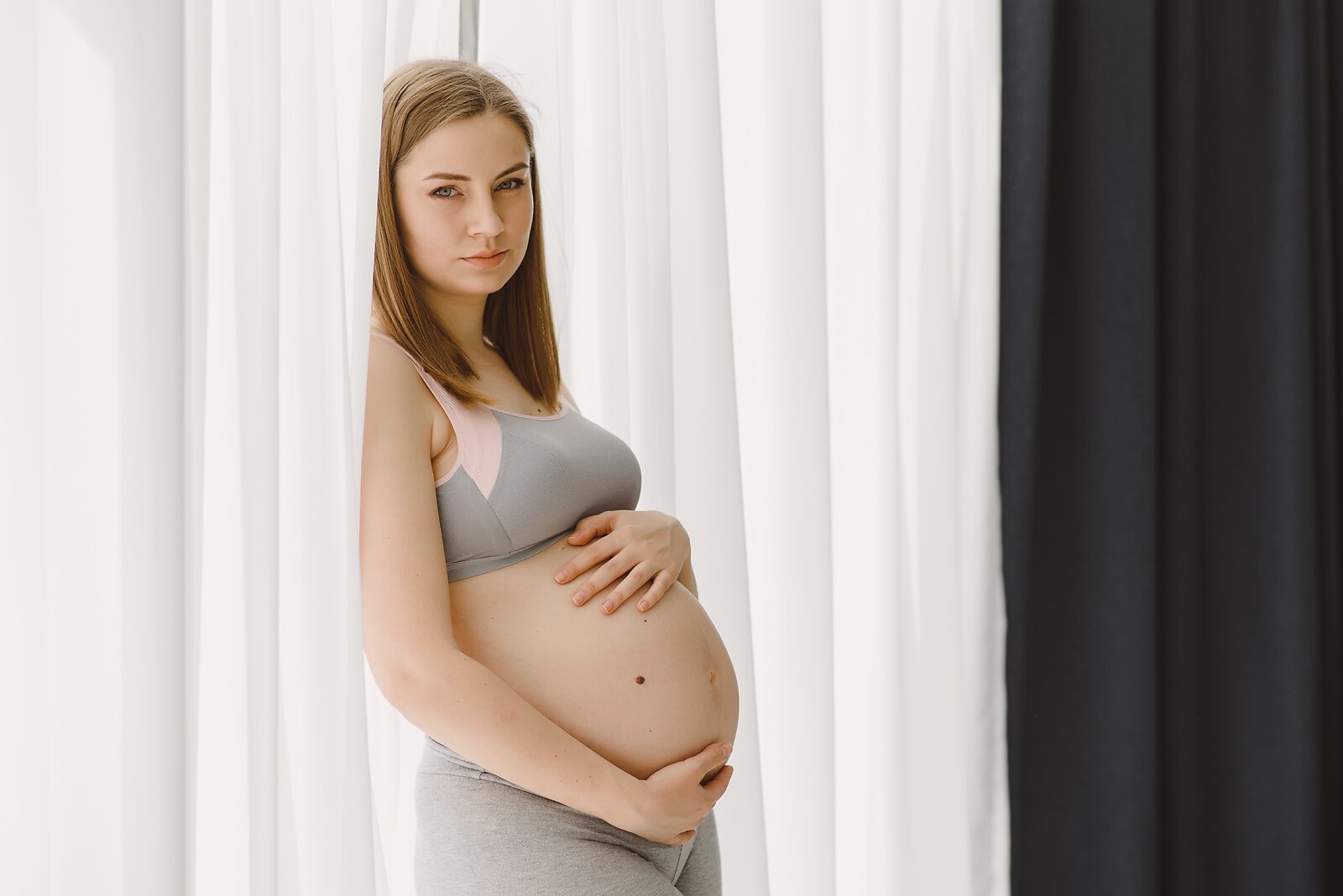 Pregnant woman experiencing prenatal depression at home