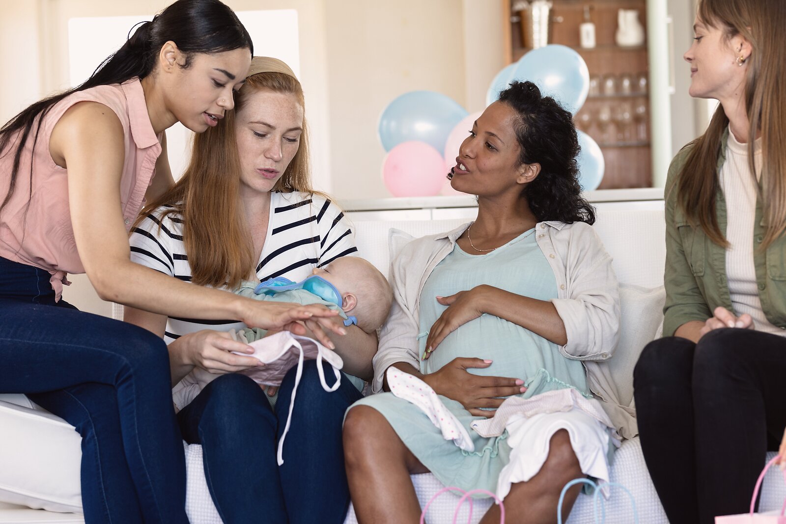 Women supporting one another in a perinatal community setting